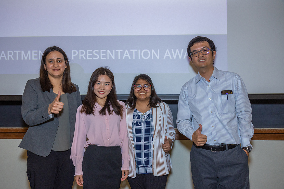 man and three women post for photo at Grad Presentation 2024