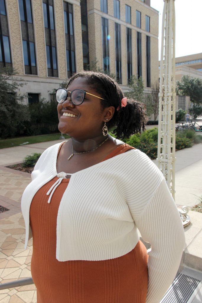 Student standing on campus