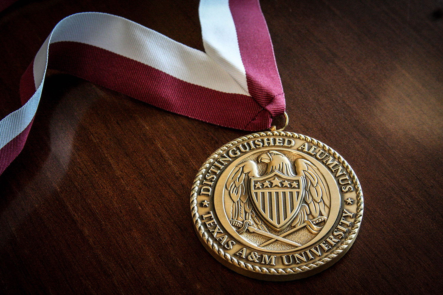 A Texas A&M Distinguished Alumnus gold medallion