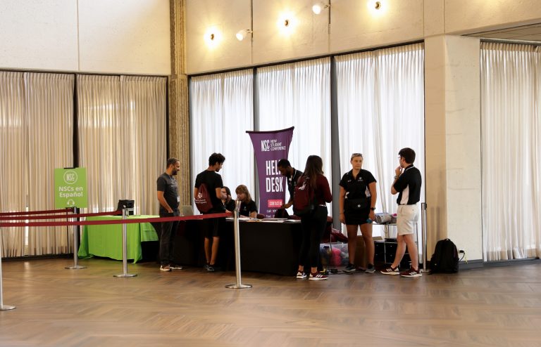 students man the Rudder Help Desk inside the Rudder tower