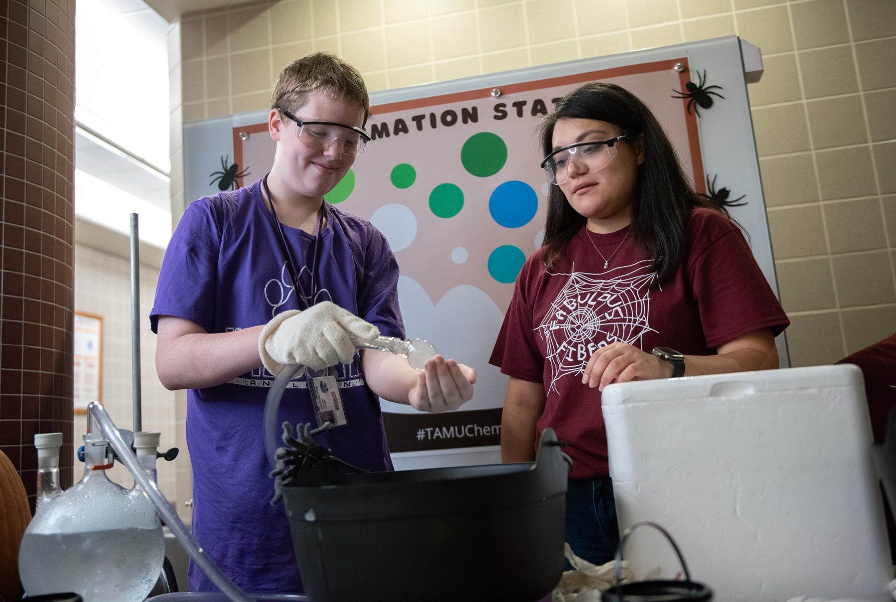 Texas A&M chemistry graduate student Jeanette Piña, demonstrating sublimation at the 2022 Chemistry Open House 