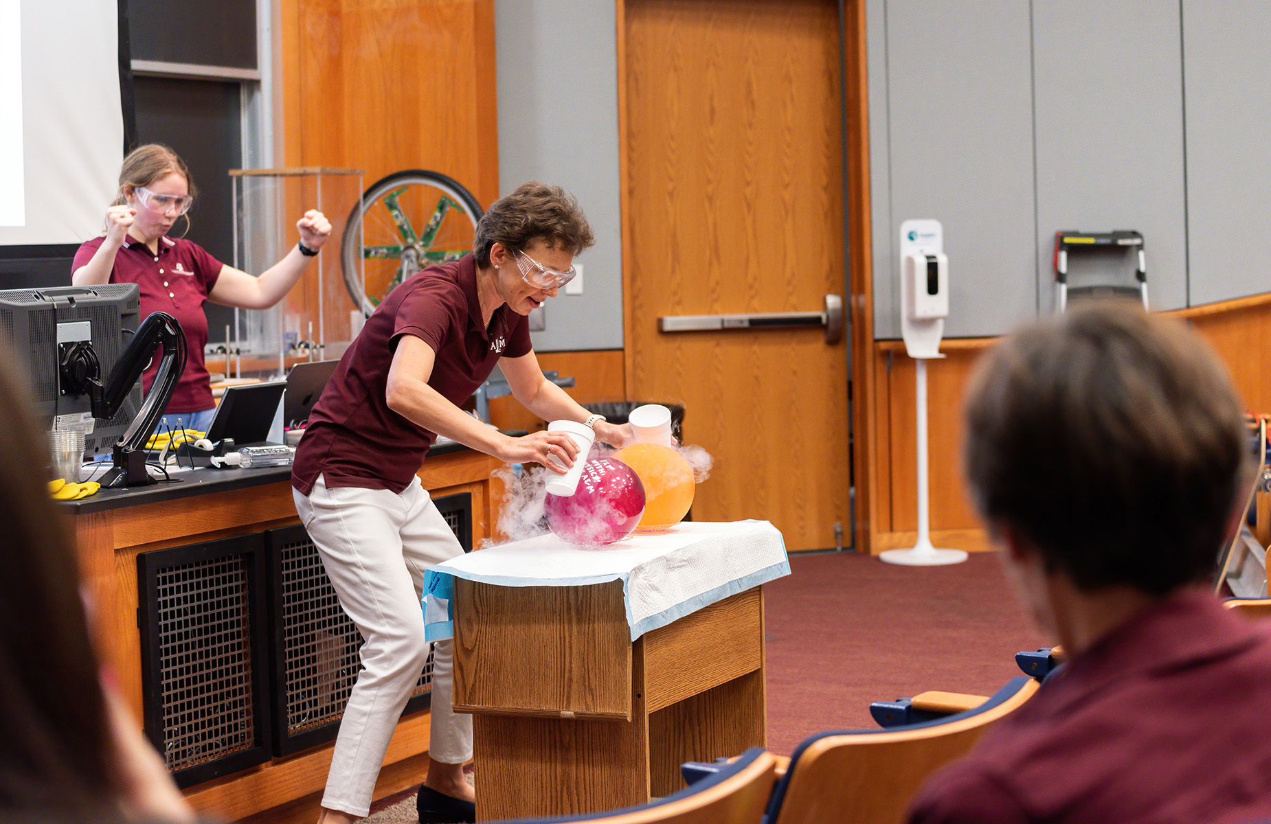 Texas A&amp;M physicist Tatiana Erukhimova performs an experiment at the Mitchell Institute Physics Enhancement Program for high school physics teachers