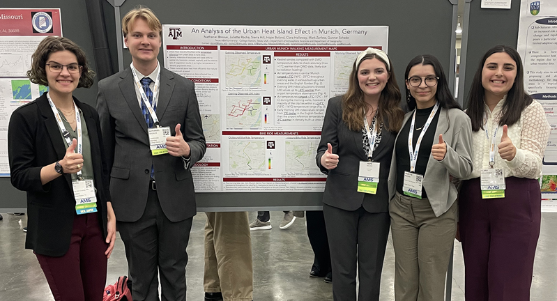 Group photo of Texas A&M University undergraduate meteorology students and their award-winning poster at the 23rd Annual Student Conference for the American Meteorology Society