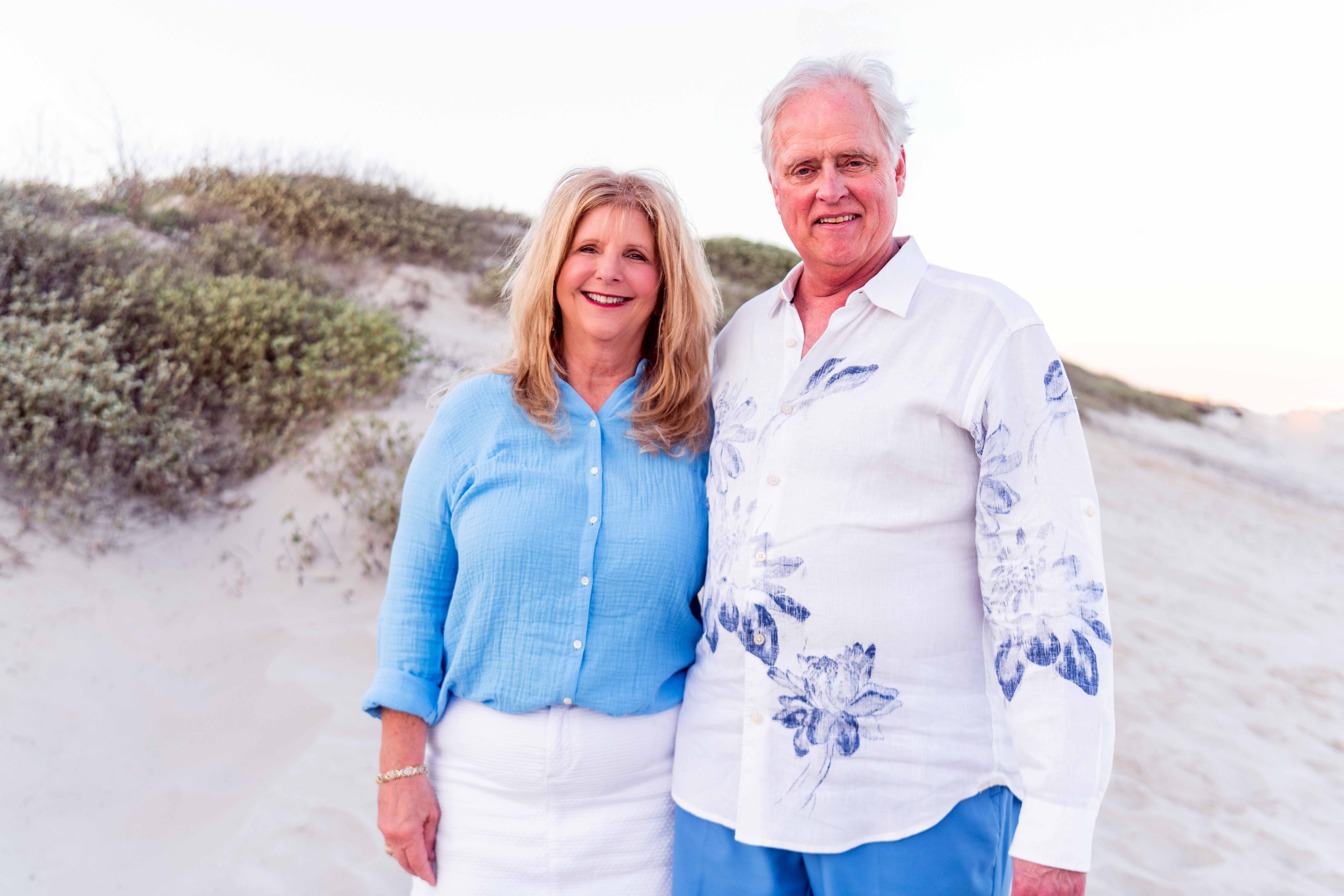 Texas A&amp;M University former students and College of Arts and Sciences donors Clarissa and Steve Streetman smile for the camera while on a beach