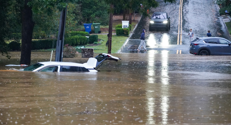 Flooded streets and stranded cars in the Peachtree Creek area of Atlanta, Georgia, on September 27, 2024, as a result of Hurricane Helene