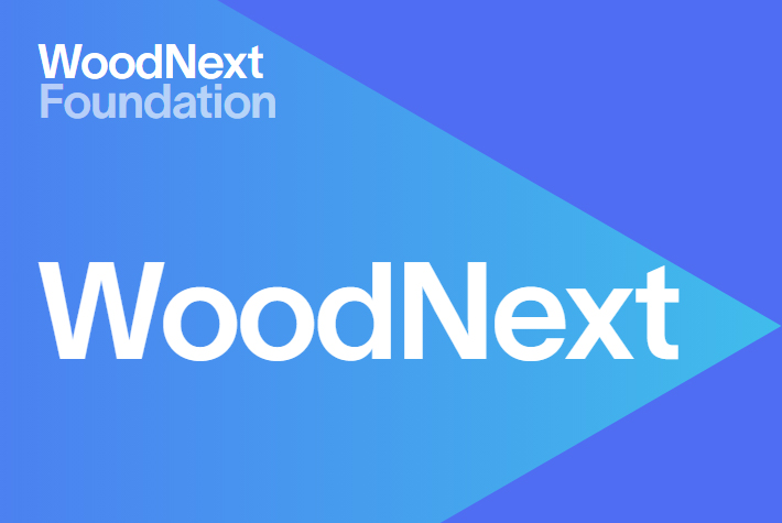 Graphic displaying the words “WoodNext Foundation” and “WoodNext” in white text on a background featuring triangular shapes in varying shades of blue.